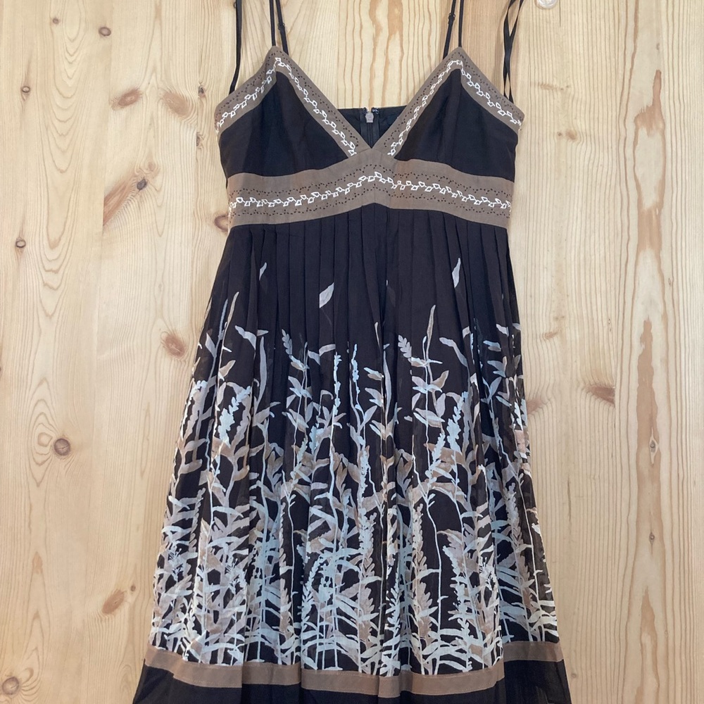 BCBG MAXAZRIA dress with adjustable straps and feminine details throughout